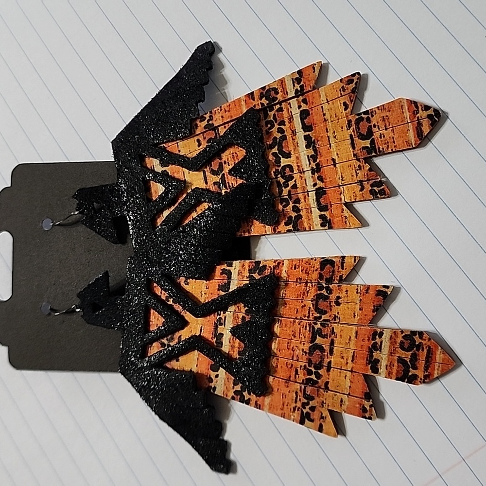 Handmade Thunderbird Cork backed leather earrings